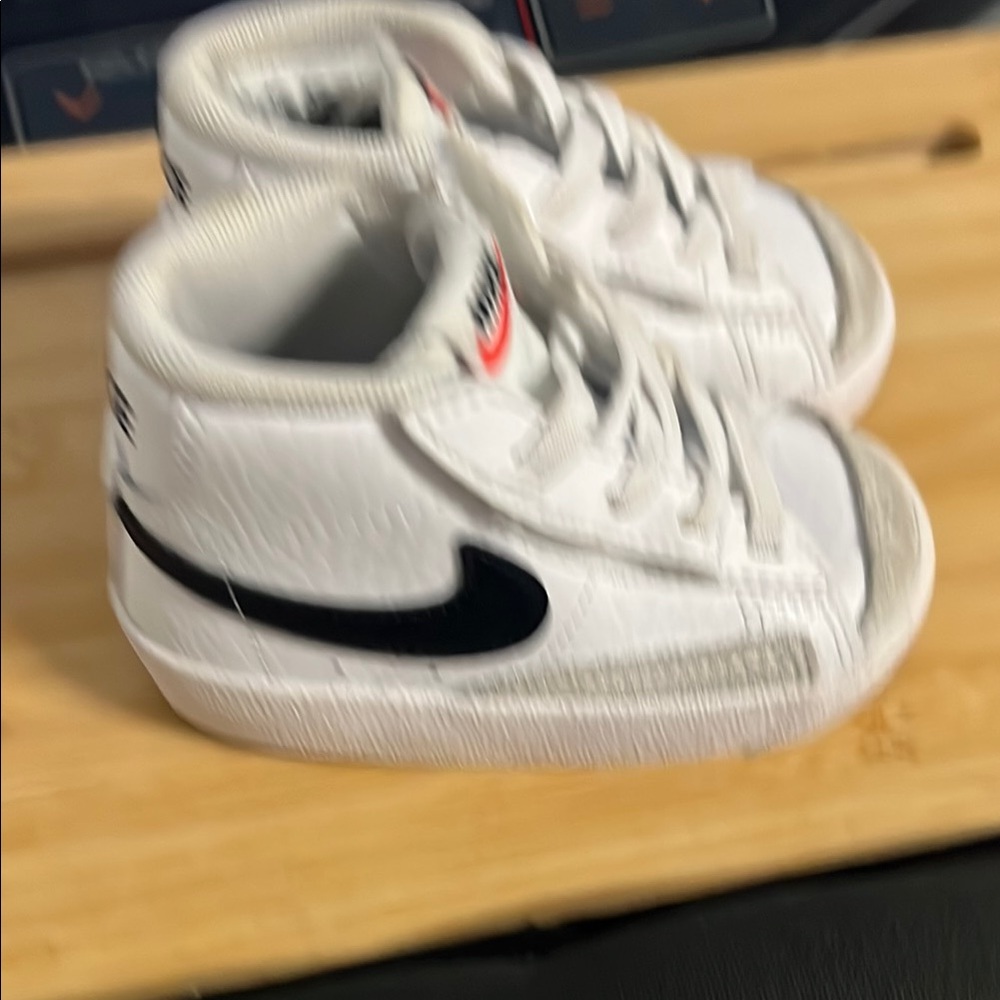 Nike White and Black Sneakers with High-Top Design